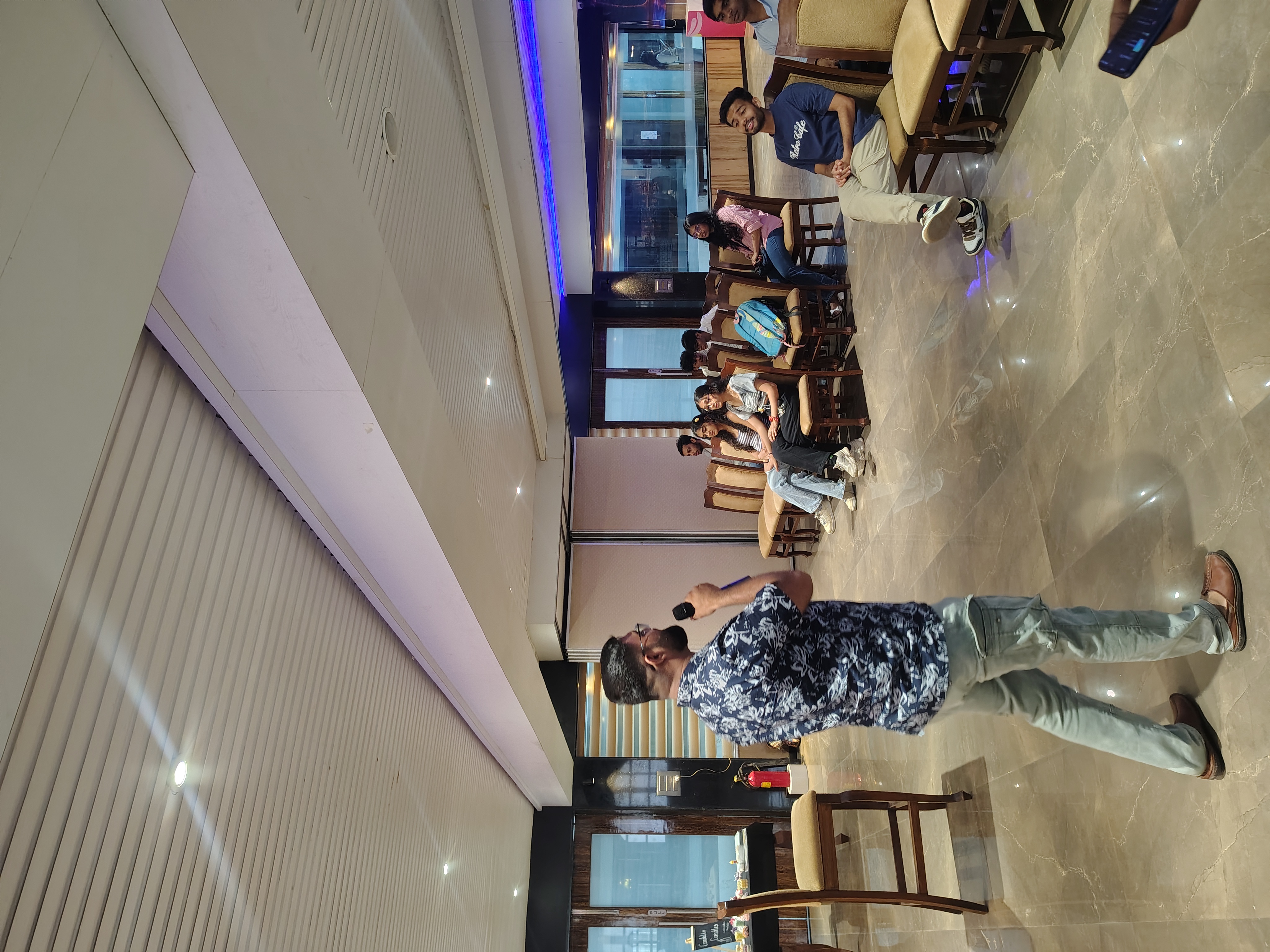 On-ground team managing entry flow with mobile coordination